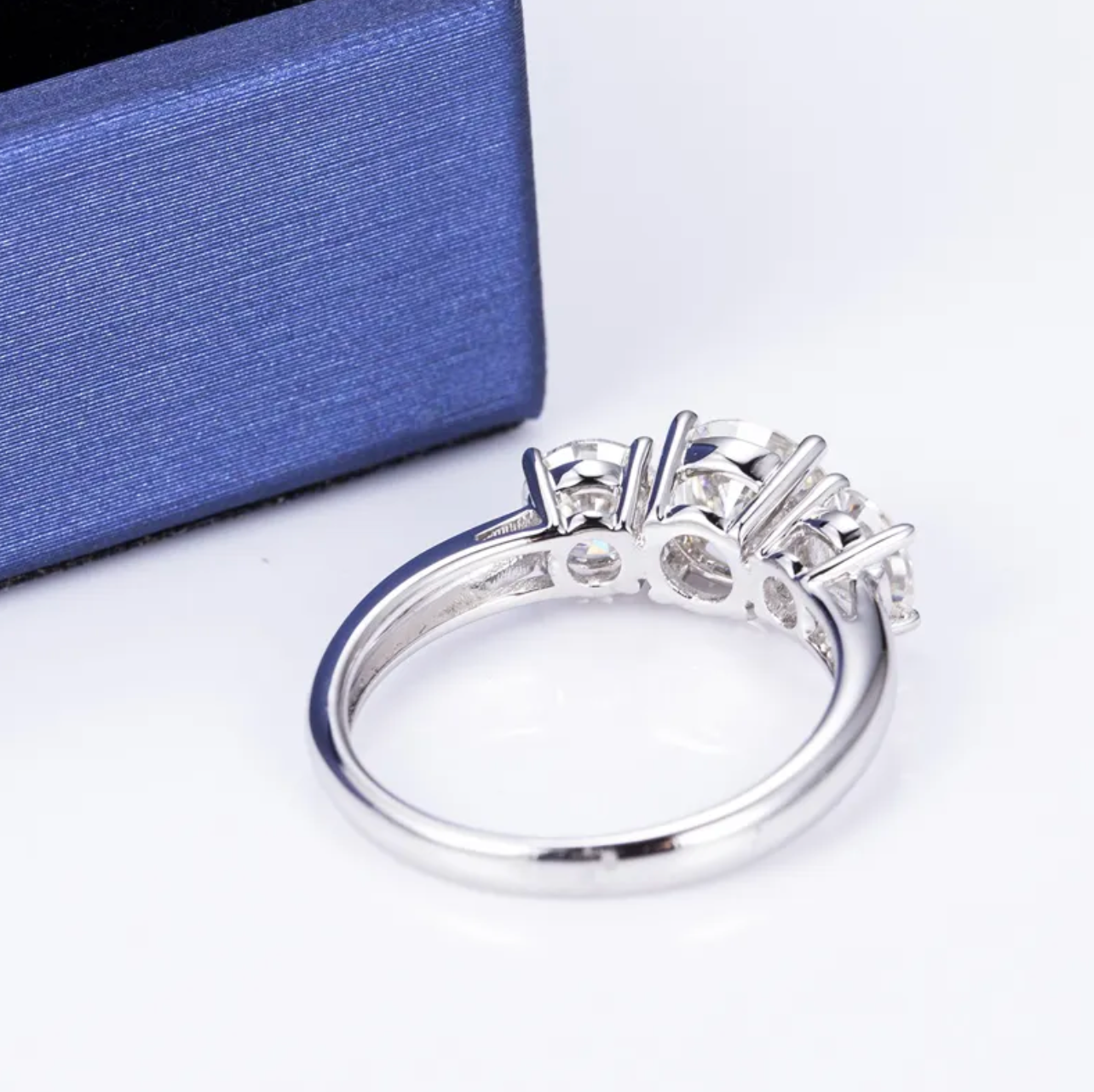 Round Three Stone Engagement Ring