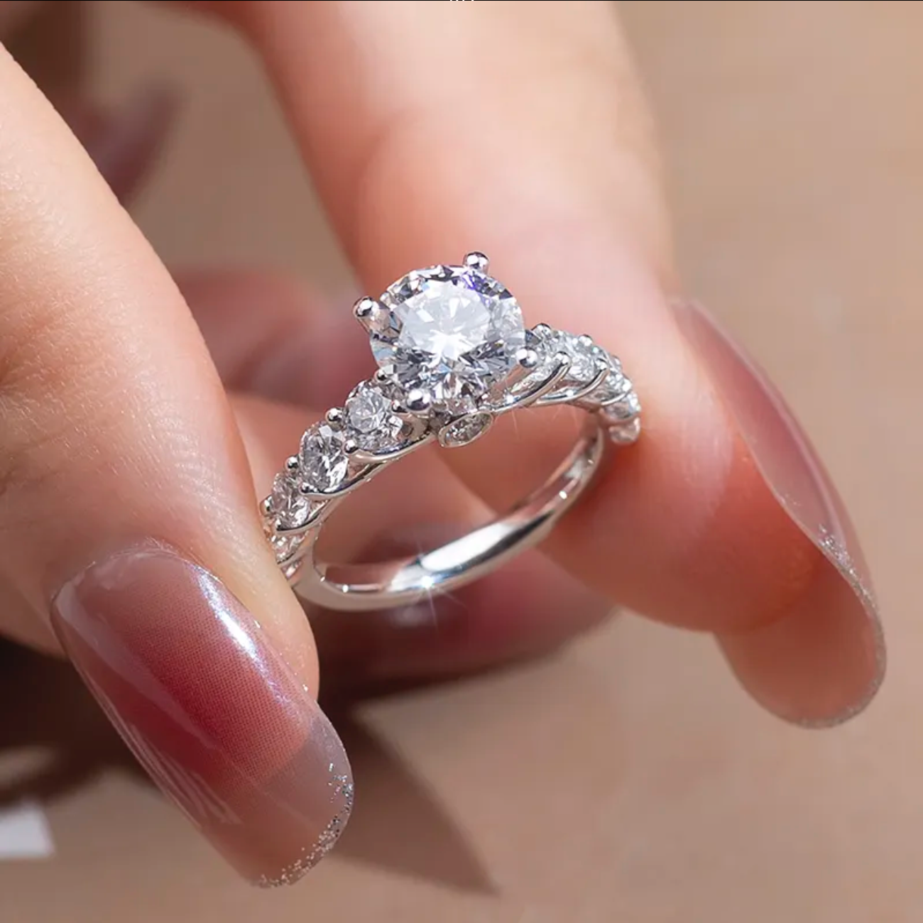 Round Solitaire With Side Stones Engagement Ring