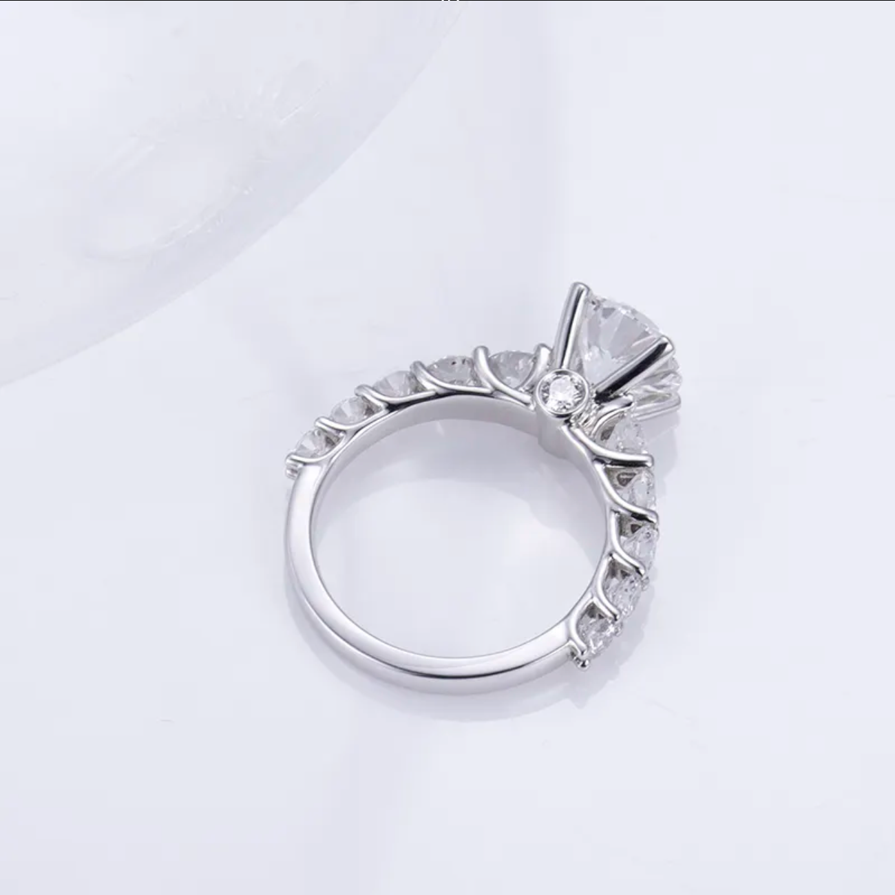 Round Solitaire With Side Stones Engagement Ring