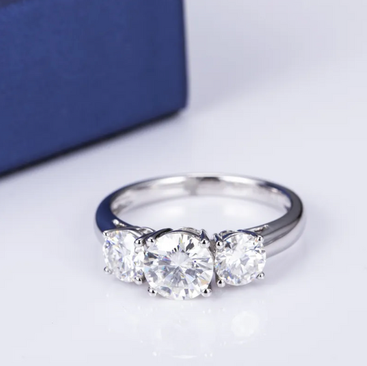 Round Three Stone Engagement Ring