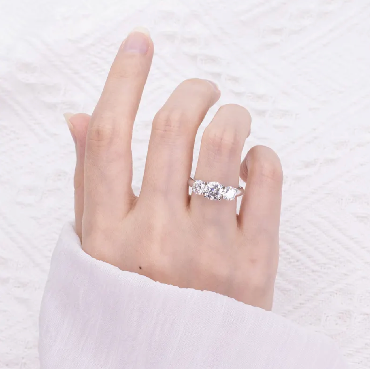 Round Three Stone Engagement Ring