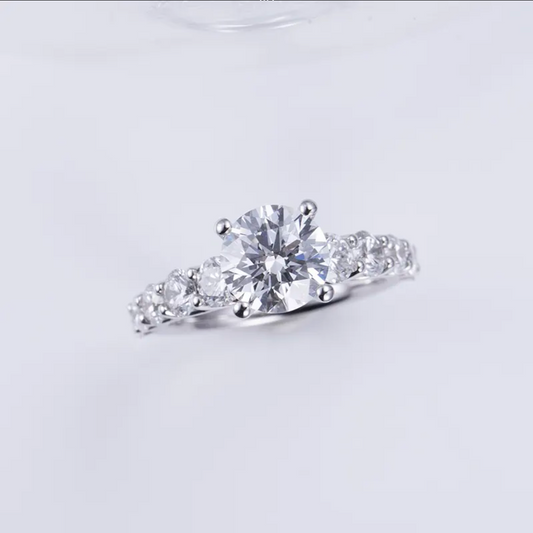Round Solitaire With Side Stones Engagement Ring